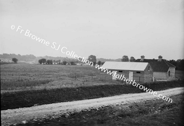 VIEW OF HOUSE AND COUNTRYSIDE FROM TRAIN